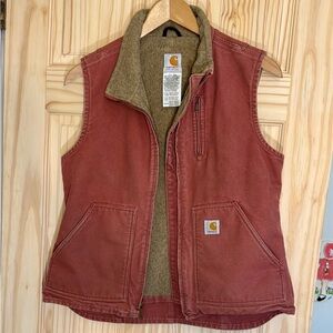 Carhartt Vest with Fleece lining and lots of pockets.